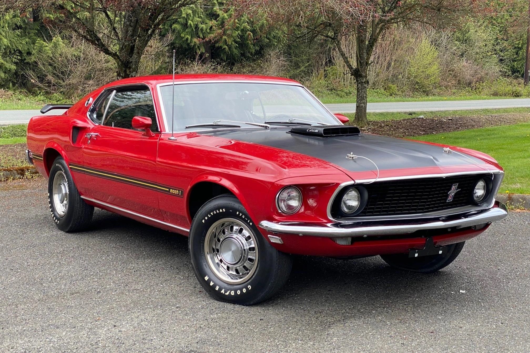 A parked 1969 Ford Mustang Mach I Cobra Jet