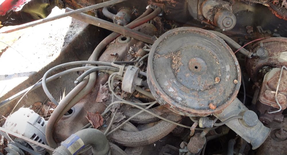 Inside the engine bay of this 1975 Dodge Dart Sport