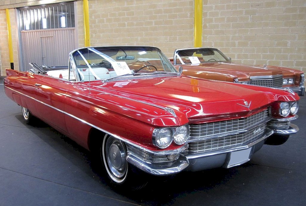 The front grille of the 1963 Cadillac Series 62 was broad and commanding, featuring a horizontal orientation that evoked a sense of power and prestige. 