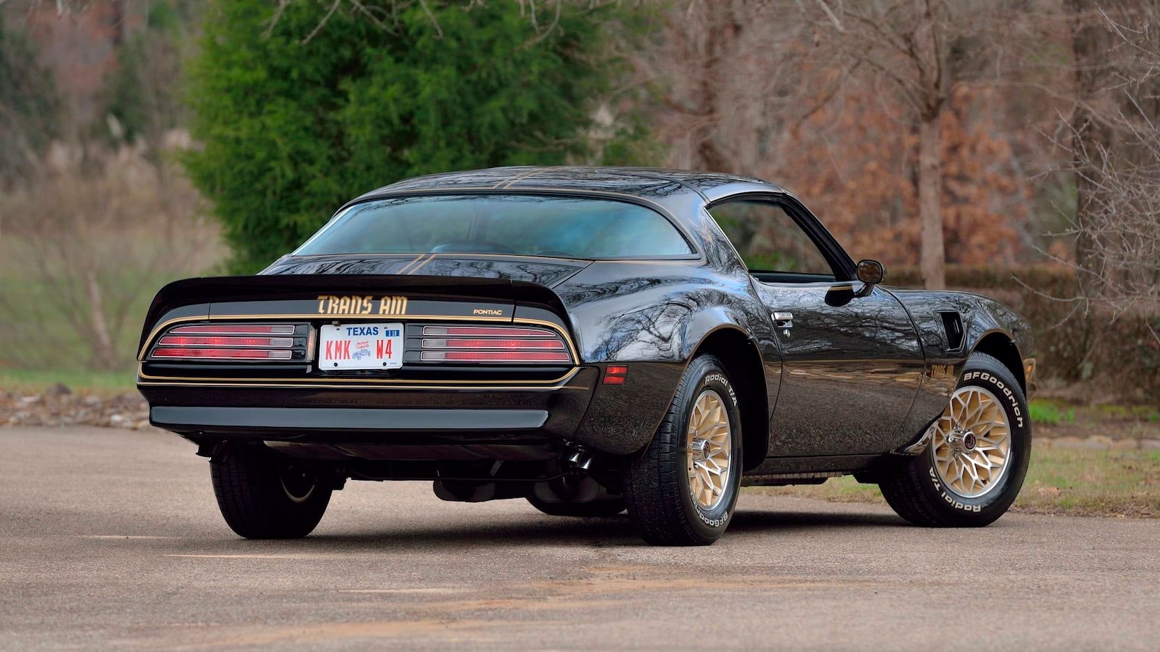 Black 1977 Pontiac Firebird Trans Am SE, parked