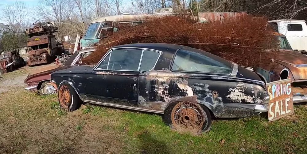 A first-generation Plymouth Barracuda at Old Car City in Georgia