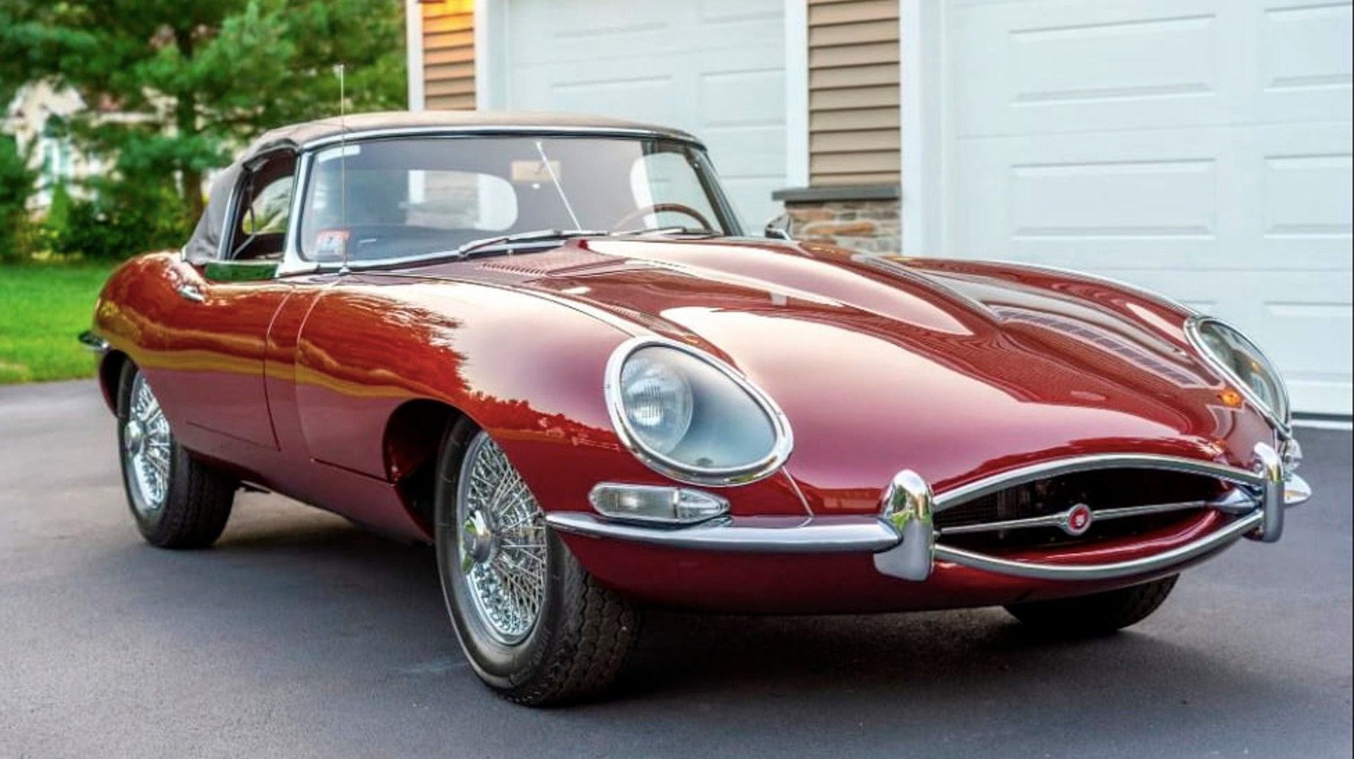 Passenger side shot of an E-Type Coupe. 