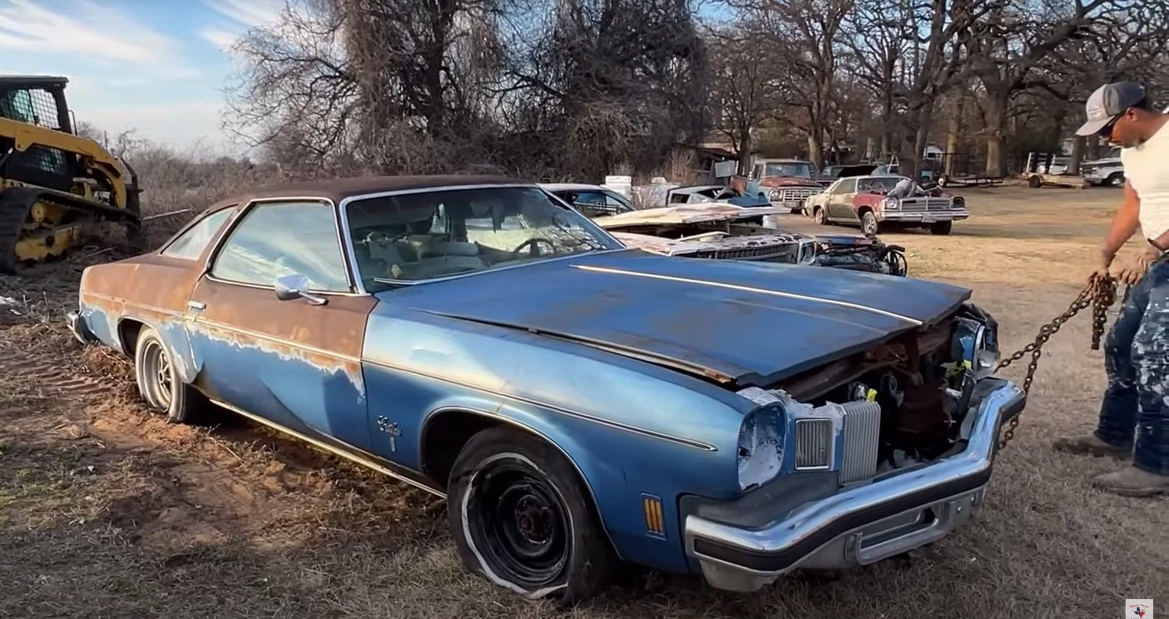 blue 1975 Olds Oldsmobile Cutlass Texas yard